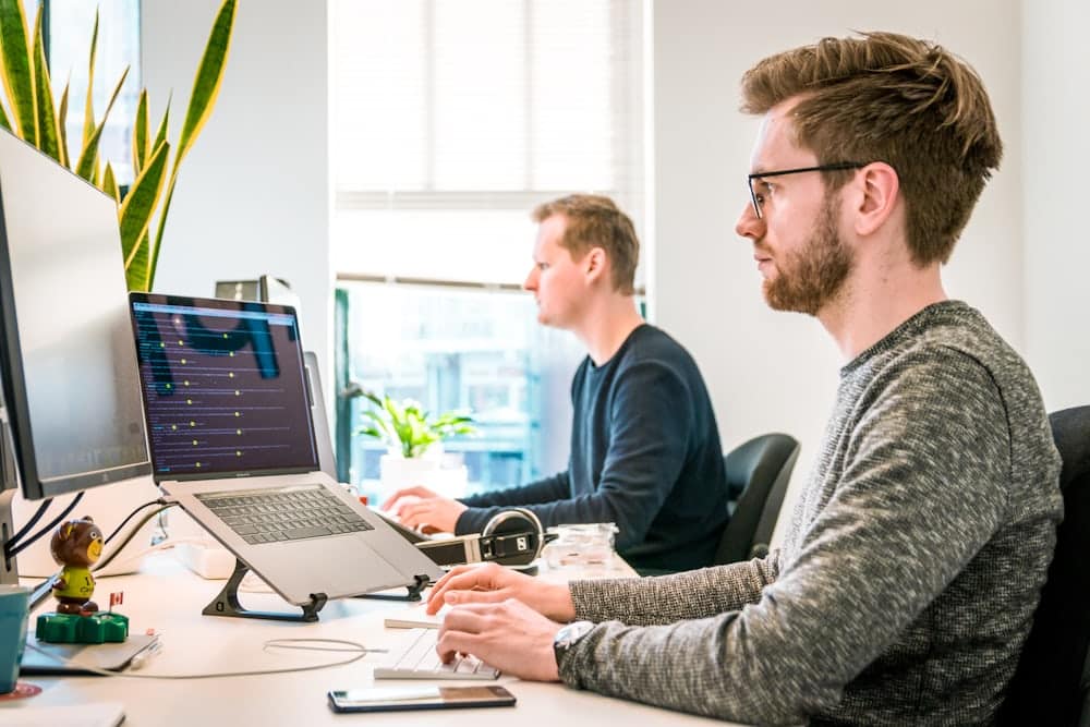 Cybersecurity analyst monitoring dark web threats and credential leaks for executive protection